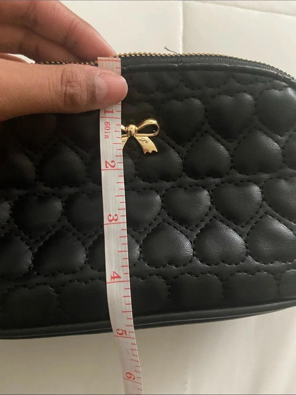 Elegant Black Quilted Women's Cosmetic Pouch with Gold Bow Accent
